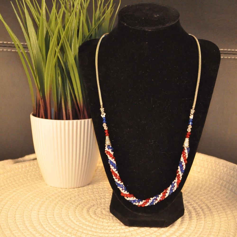 Red and Blue Beaded Necklace with Spiral Design